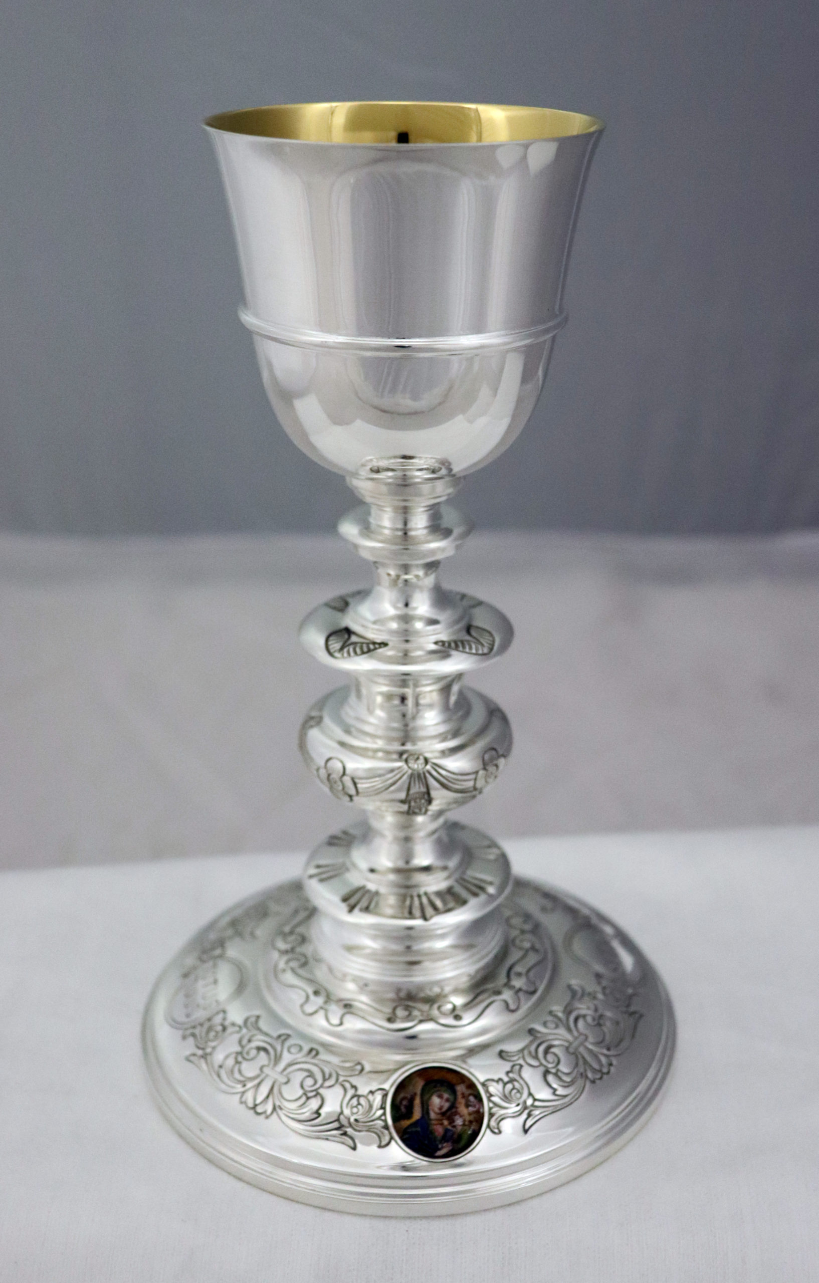 Chalice with special enamels representing John Paul II and Our Lady of Perpetual Help.